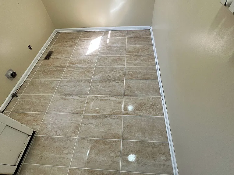 Large laundry room with washer/dryer hook up