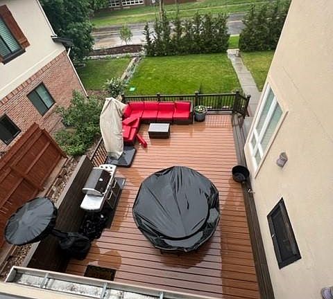 Front/side entertainment deck with indoor/outdoor fireplace, natural gas hookup for grill or firepit.