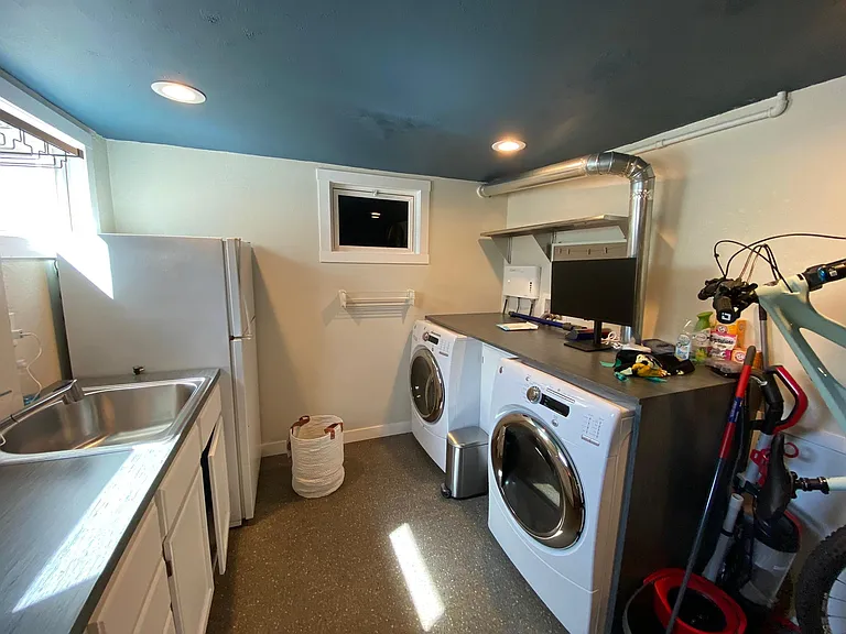 Laundry area with bike racks