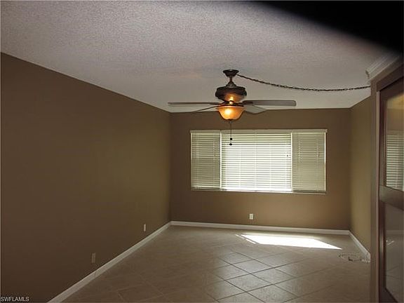Tiled living and dining area