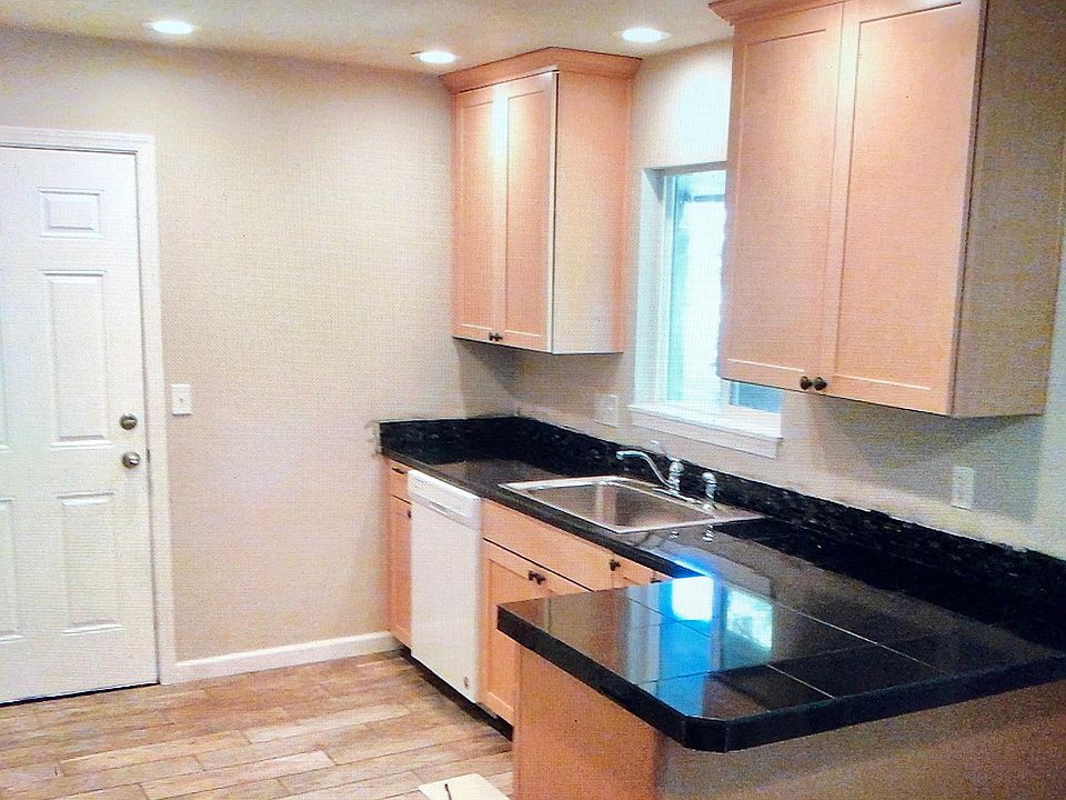 Granite tile and maple cabinets