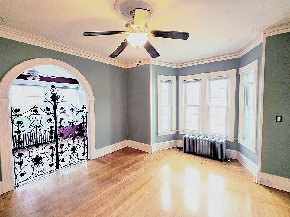 Living room with attached sunroom