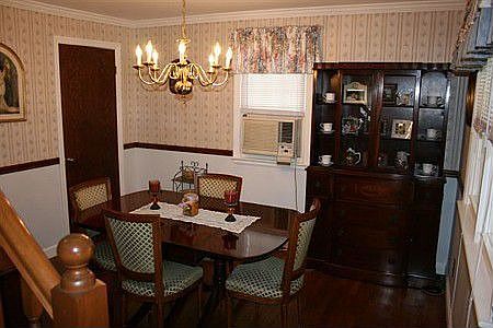 FORMAL DINING ROOM, HARDWOOD FLOORS, CLOSET, CROWN MOLDING 