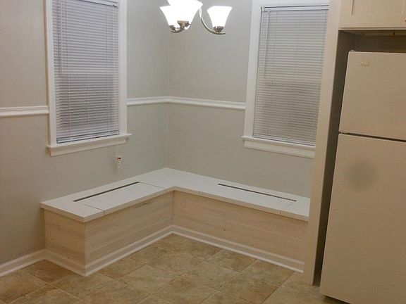 Built in banquette seating in kitchen.