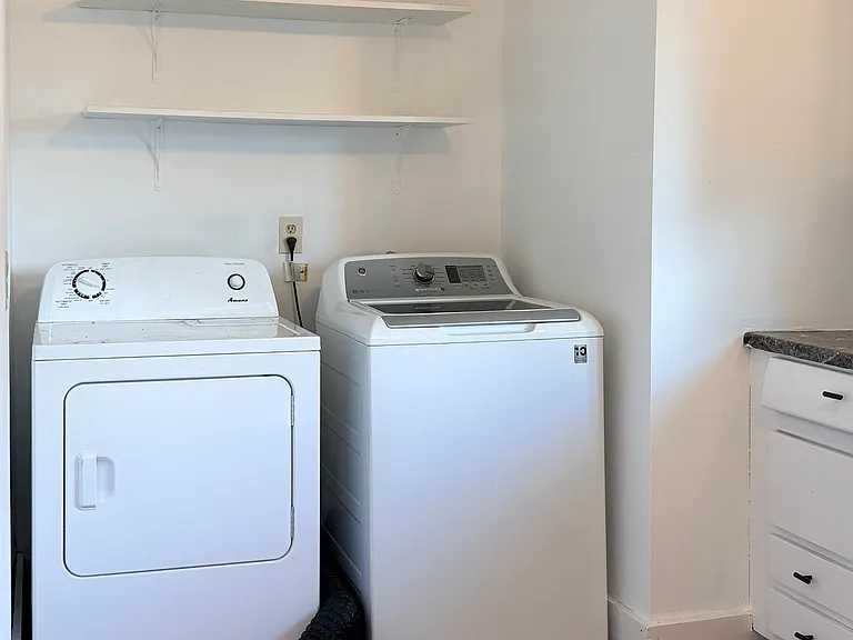 Washer and Dryer in Kitchen Tenant is responsible for all repairs and maintenance