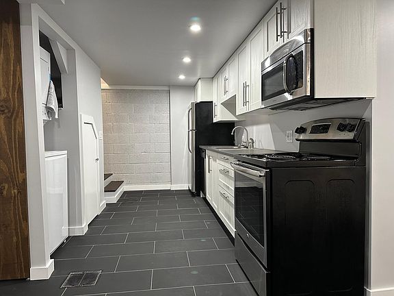 Kitchen w/laundry and storage