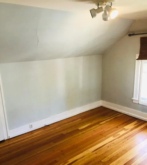 upstairs bedroom. Has new paint and light fixtures not shown