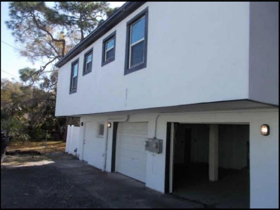 Exterior back entrance to car garage