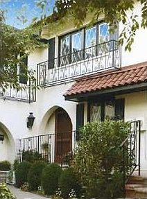 Front Entrance : Spanish style, terracotta tiles wrought iron balcony. porch space.