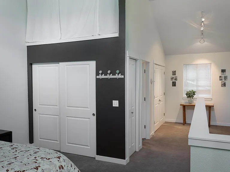 New washer/dryer conveniently located in-unit and extra storage above the closet.