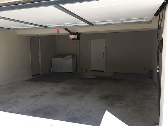 Two car garage. Washer dryer not included but there_s a hookup.