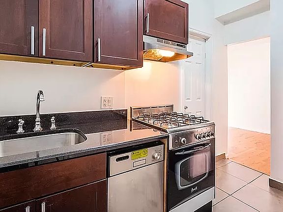 4th image of 339 E 12th St APT 28