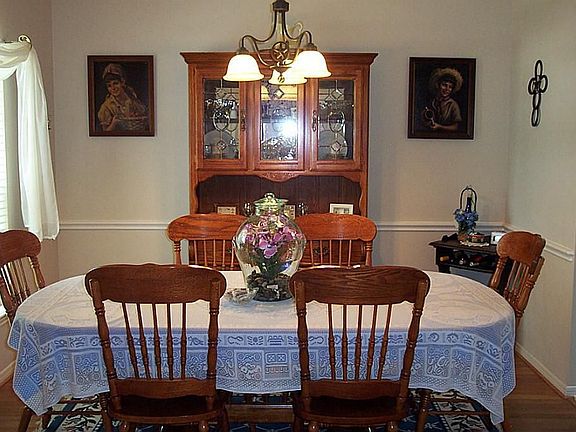 The formal dining room with laminate flooring.