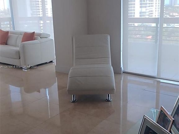 3rd image of 3500 Mystic Pointe Dr APT 1106