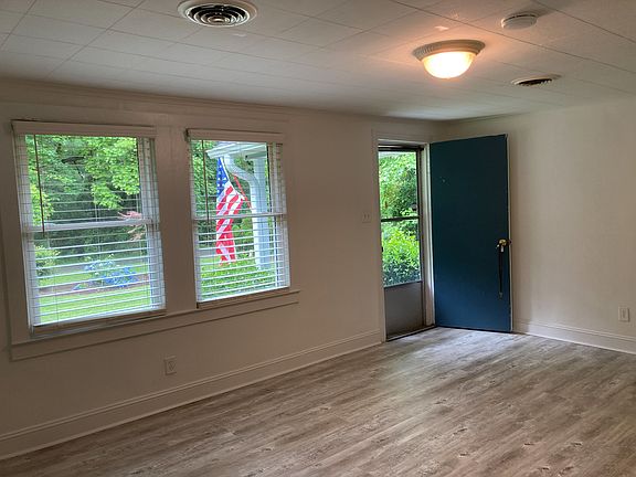 Living room. New Premium LVP flooring, Dual pane, energy efficient windows provide lots of natural light.