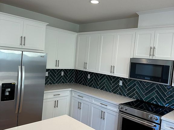 Open kitchen w/new appliances, new , new...slow close drawers.