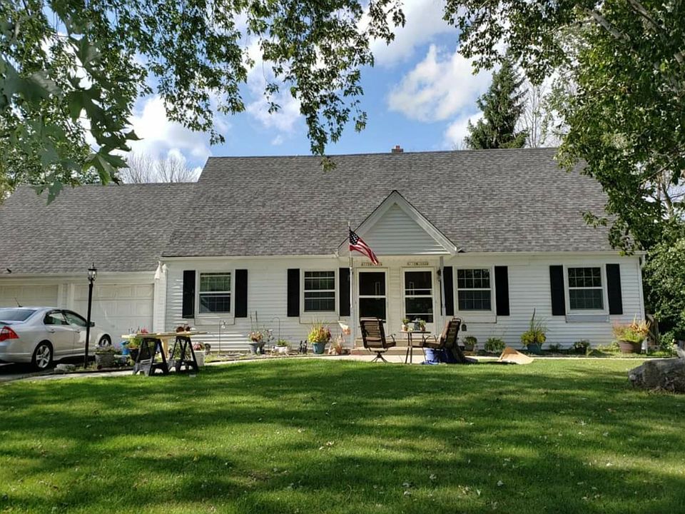 Unique Cape Cod style Townhome. Bedrooms and full bath on upper level.