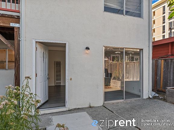The front door and sliding glass door.