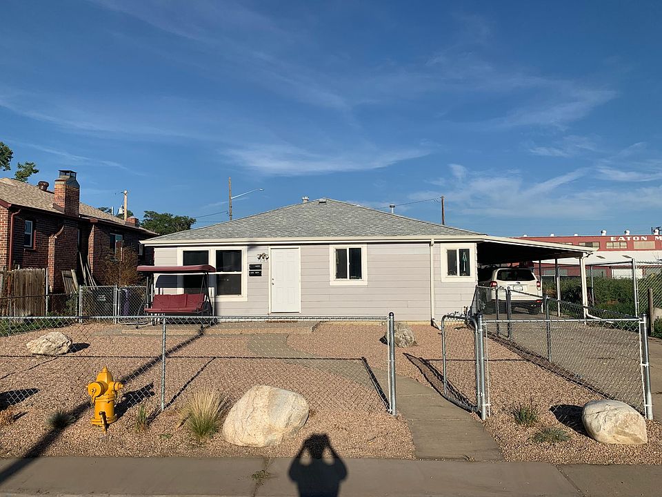 Front unit of duplex with carport spot, driveway parking, and private yard!