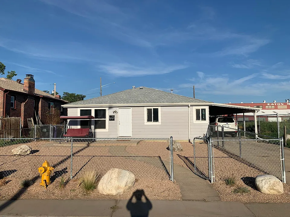 Front unit of duplex with carport spot, driveway parking, and private yard!