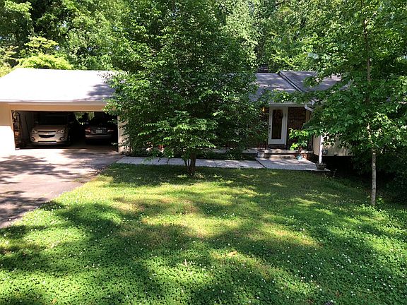 Front view with 2 car garage