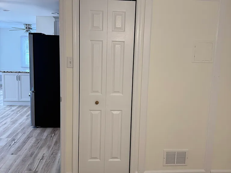 From small bedroom looking in to kitchen