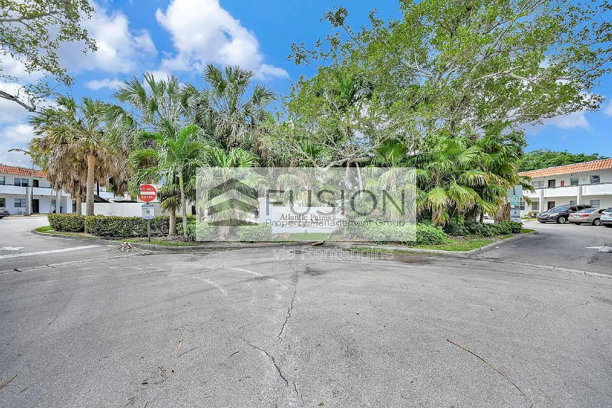 Building Photo - 400 NW 65th Ave #210