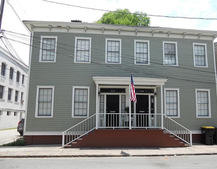 Exterior of duplex. 1114 Jefferson is on the left