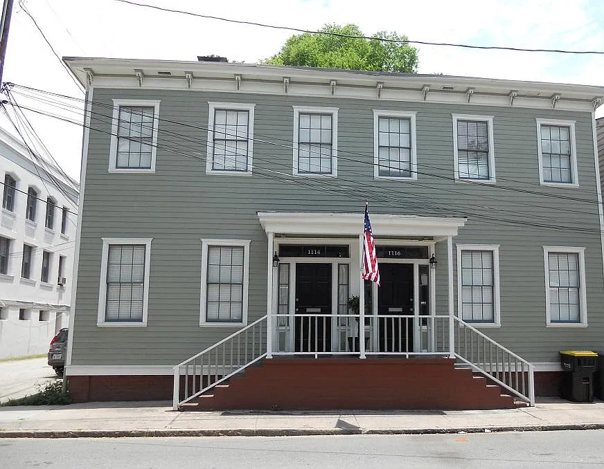 Exterior of duplex. 1114 Jefferson is on the left