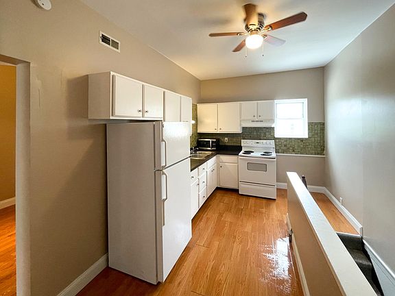The spacious kitchen area shown from the dining room entry,