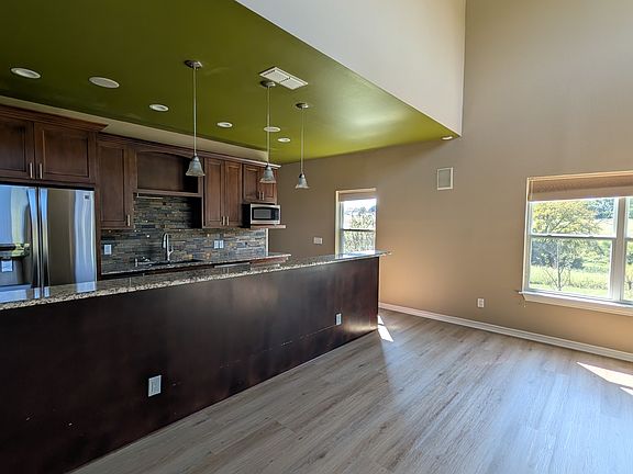 The living room and kitchen