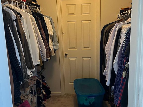 Walk-in closet. The door at the back leads to an attic storage room, but we will be using that for storage.