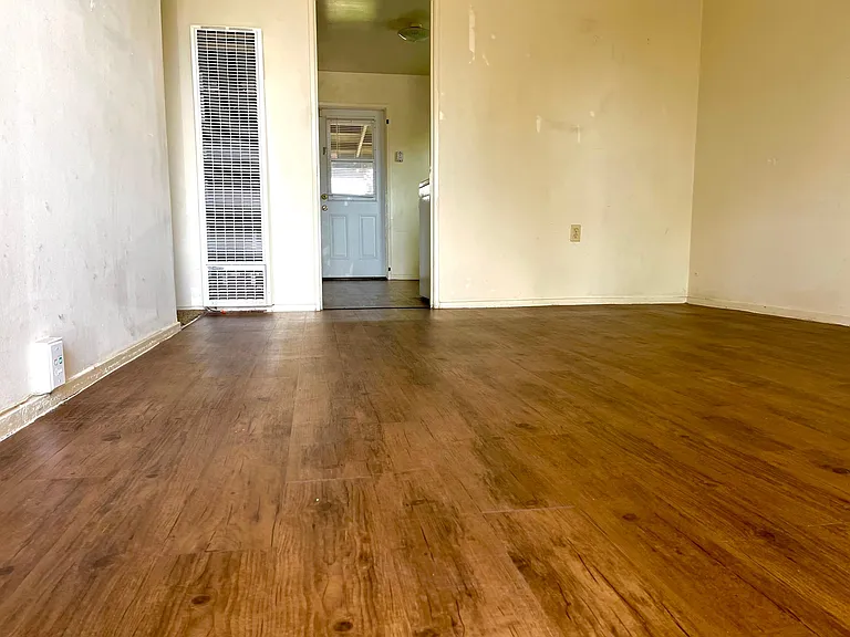 Living room is getting new paint this week! Beautiful LVP flooring.