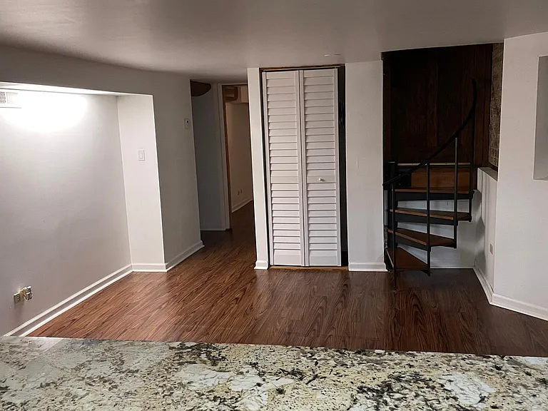 View from breakfast nook into open floor plan living room.
