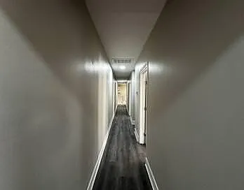 Hallway from living room to the rest of the apartment