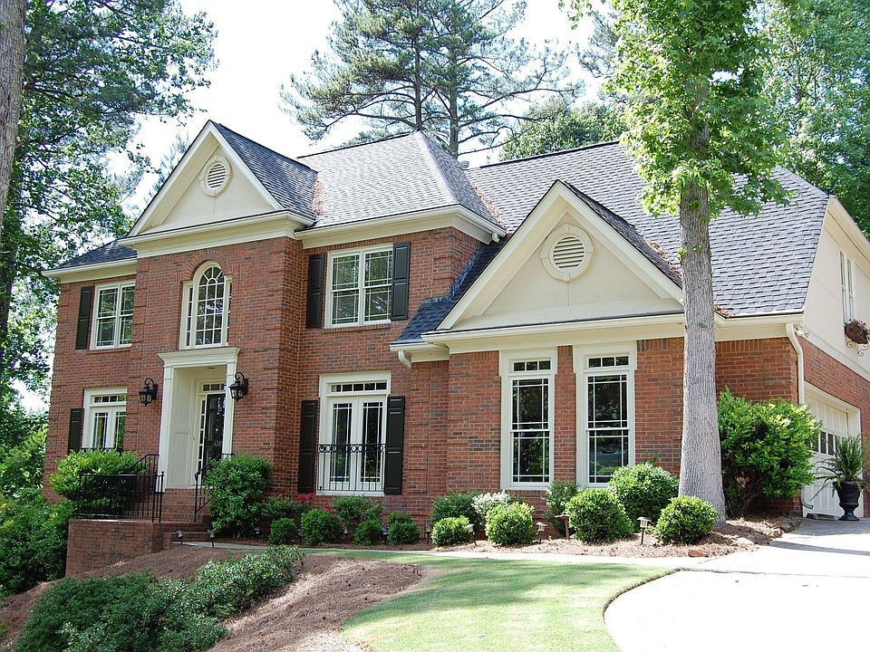 Three sided brick home