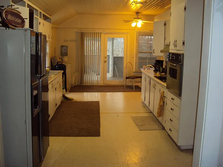 Upper kitchen with deck view