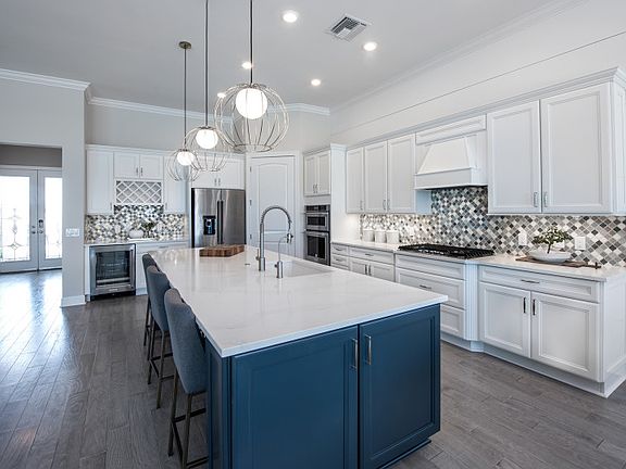 Gourmet Kitchen with Quartz Counters and Stainless Steel Appliances