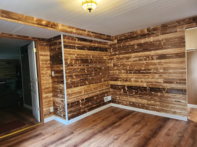 smaller of 2-room basement suite