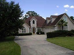 Stunning Stucco Waterfront Home in Gated Neighborhood!
