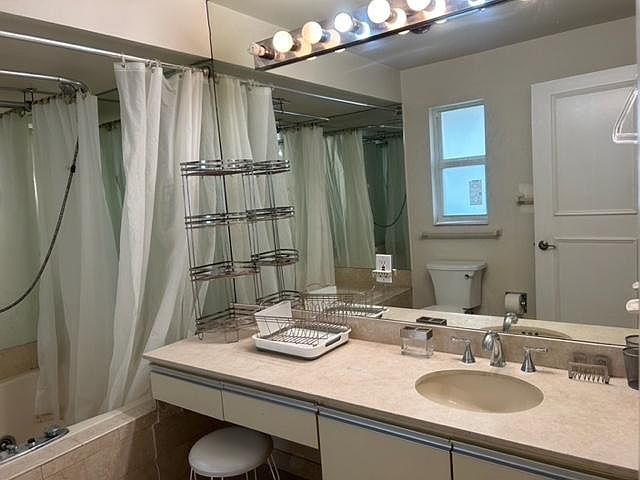 Large master bathroom with marble vanity top space to wash dishes, make coffee