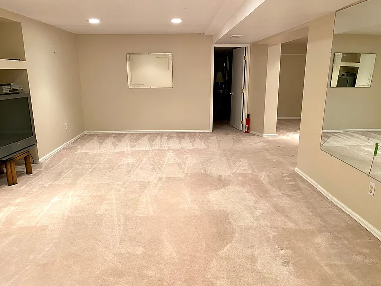 View of bedroom and rec room, or just an additional room.