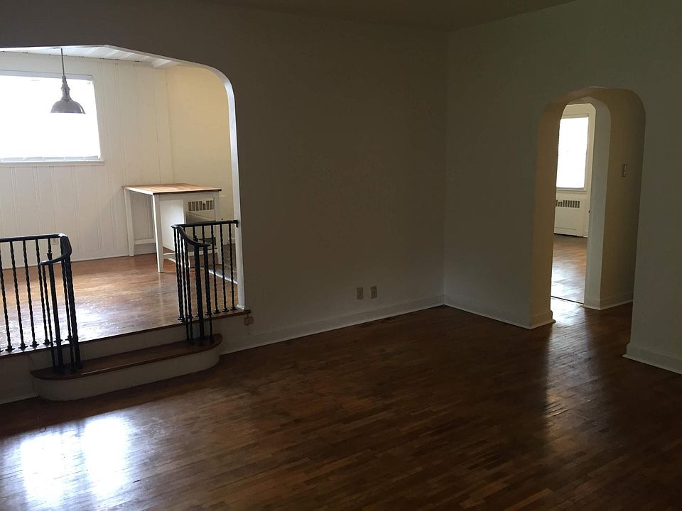 Living room view to dining/kitchen and bedrooms.