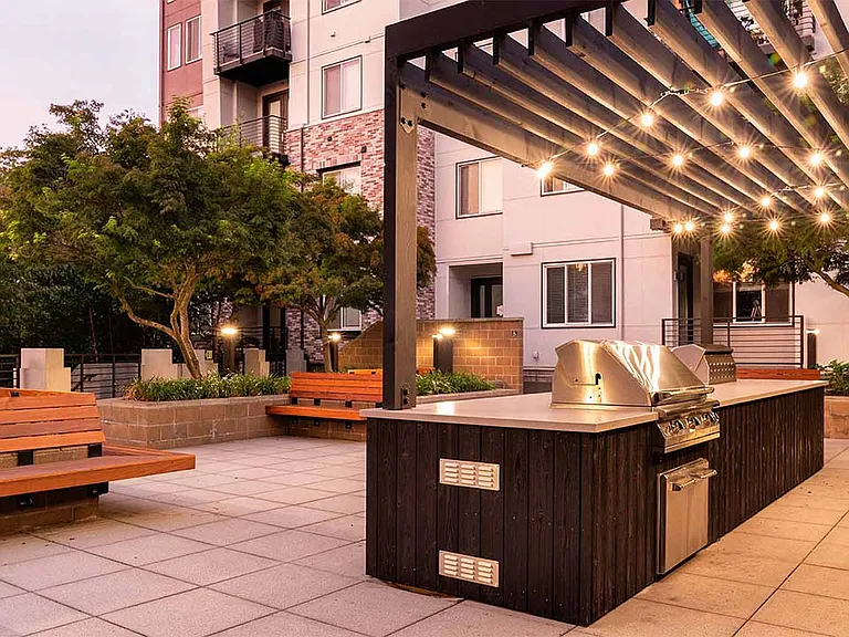 Apartment community outdoor grilling station at Griffis Lake Washington in Renton, Washington.