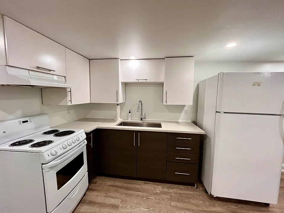 Full kitchen with brand new fridge