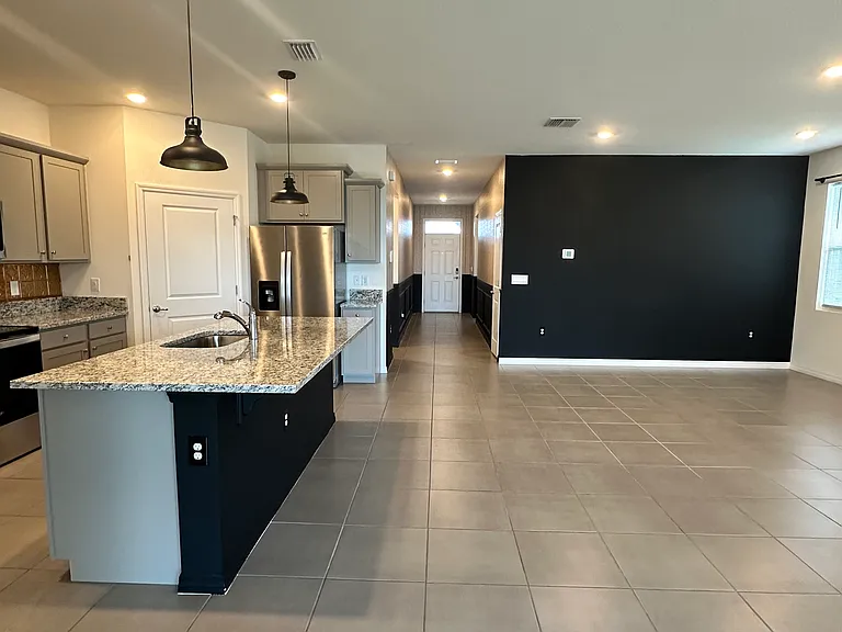 Open plan living area and kitchen.