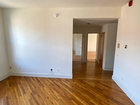 Bedroom looking into hall to living room