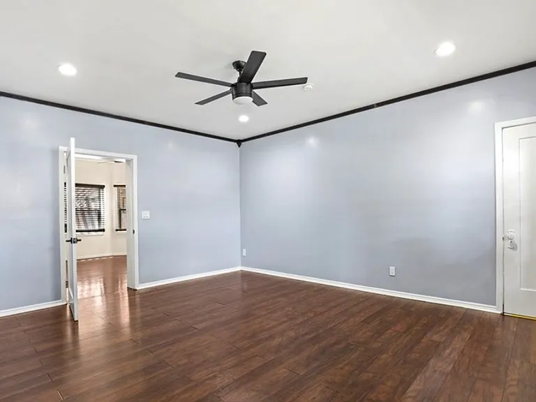 Master bedroom leading into dining room