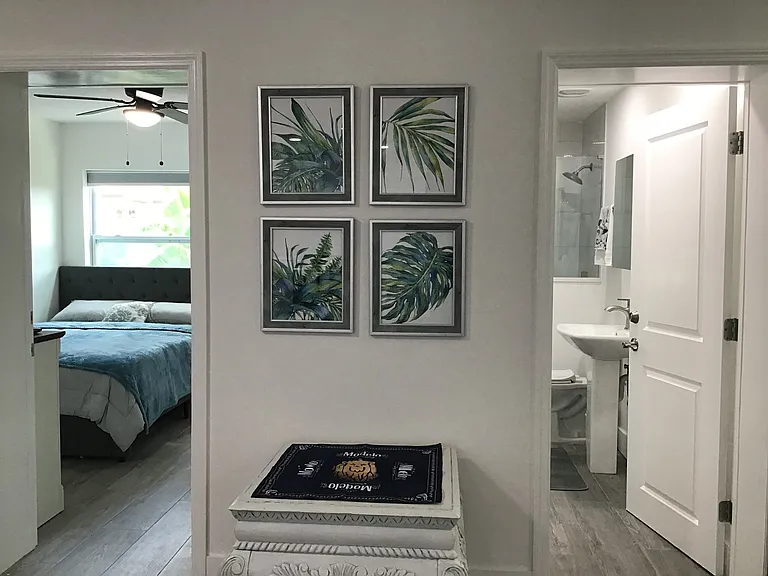 Two entrances to the private suite from the main home reveal the flexible connection that can remain open or locked for privacy.