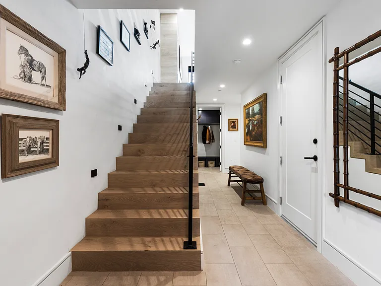 Entry with door to private garage on right